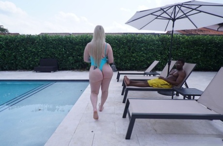 Curvy blonde Jenna Starr rides a big black cock while flaunting her big ass (21 photos)