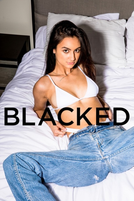 Slim pornstar Eliza Ibarra takes a dark cock after stripping on a bed (20 photos)