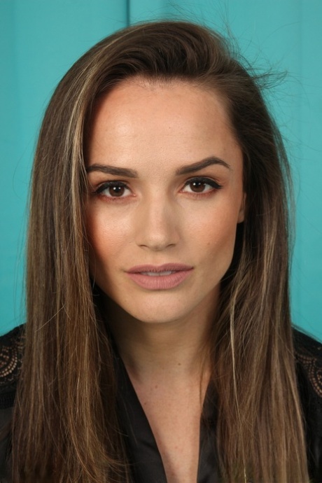 Pretty brunette Tori Black gets completely naked during solo action on her bed (15 photos)