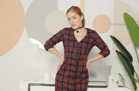 Redheaded teen Jia Lissa lets her hair down during a finger fuck (15 photos)